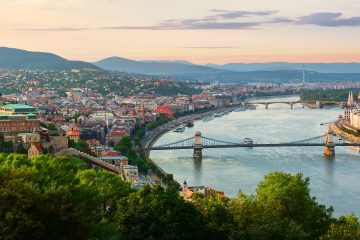 Panoramic view from above on landmarks of Budapest at summer sunset, Hungary