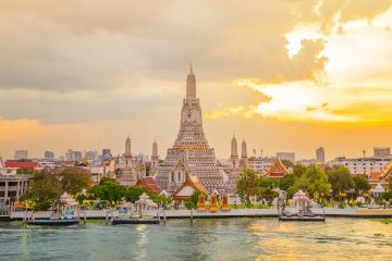 Wat Arun panorama view at sunset, A Buddhist temple in Bangkok, Thailand, Wat Arun is one of the most well known of Thailand's landmarks and Thailand is one of the best places to visit in Asia.