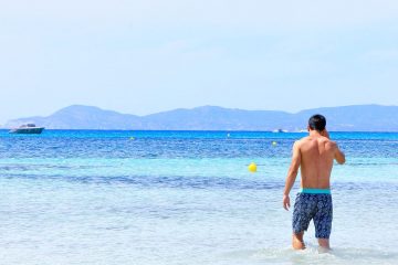 man-in-water-beach