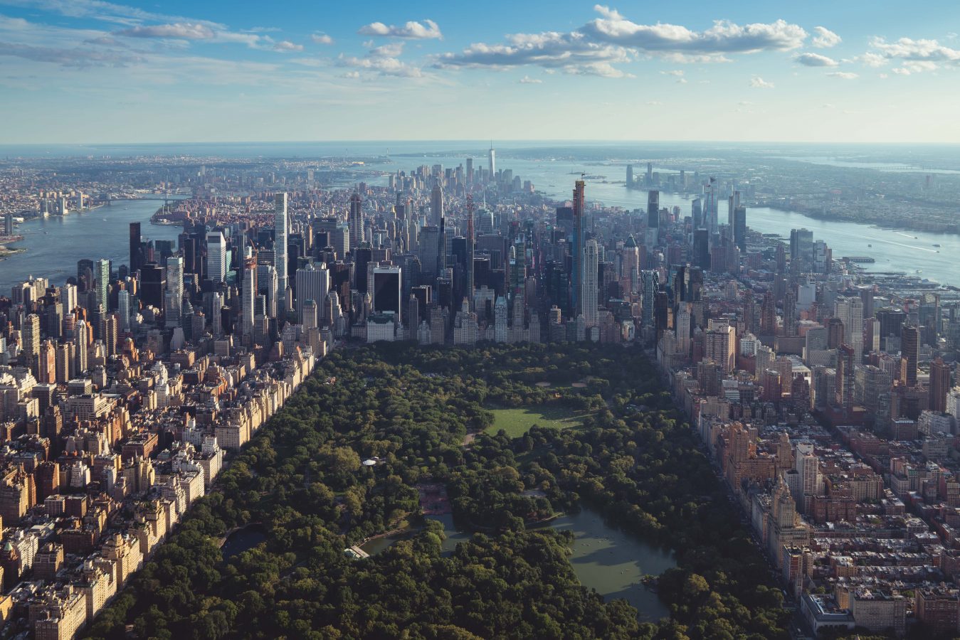 Aerial view over Central Park and New York City. NYC is one of the cheapest destinations for 2024 to fly to.