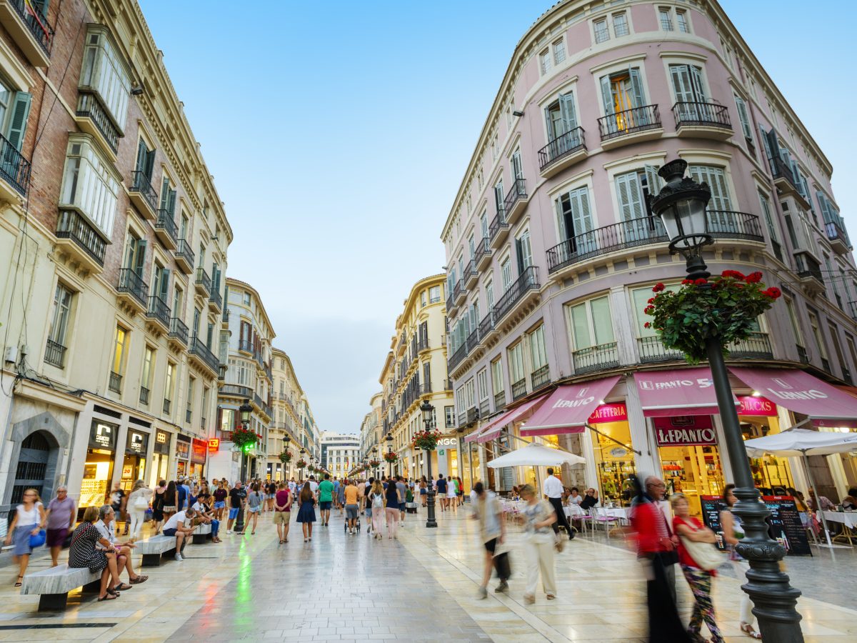 View of a busy street in the city centre of Malaga, Spain. The city is located in the south of Spain along the Mediterranean in the Andalucia region.