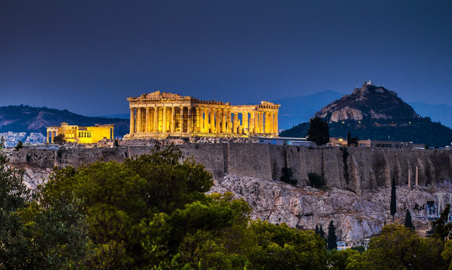 Parthenon lit up at night in Athens, Greece - one of the best study abroad destinations for art or history students.