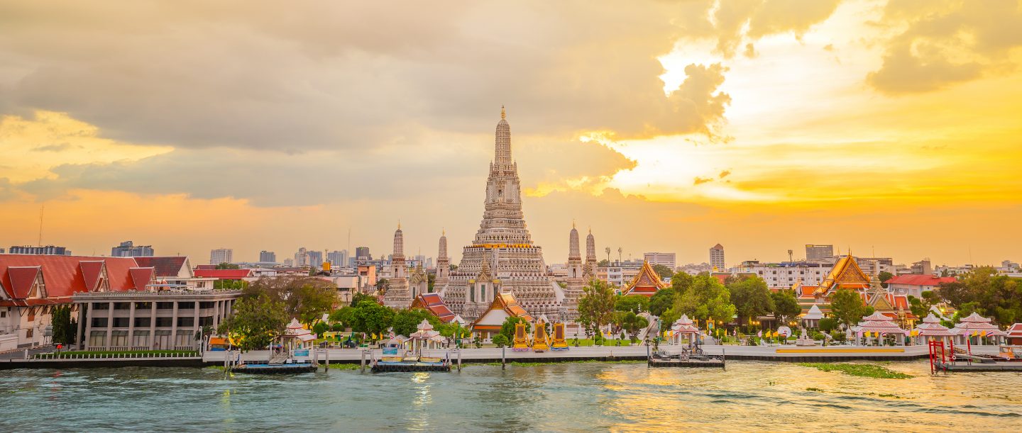 Wat Arun panorama view at sunset, A Buddhist temple in Bangkok, Thailand, Wat Arun is one of the most well known of Thailand's landmarks and Thailand is one of the best places to visit in Asia.