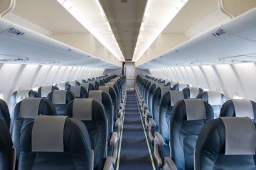 Empty airplane seats in economy class.