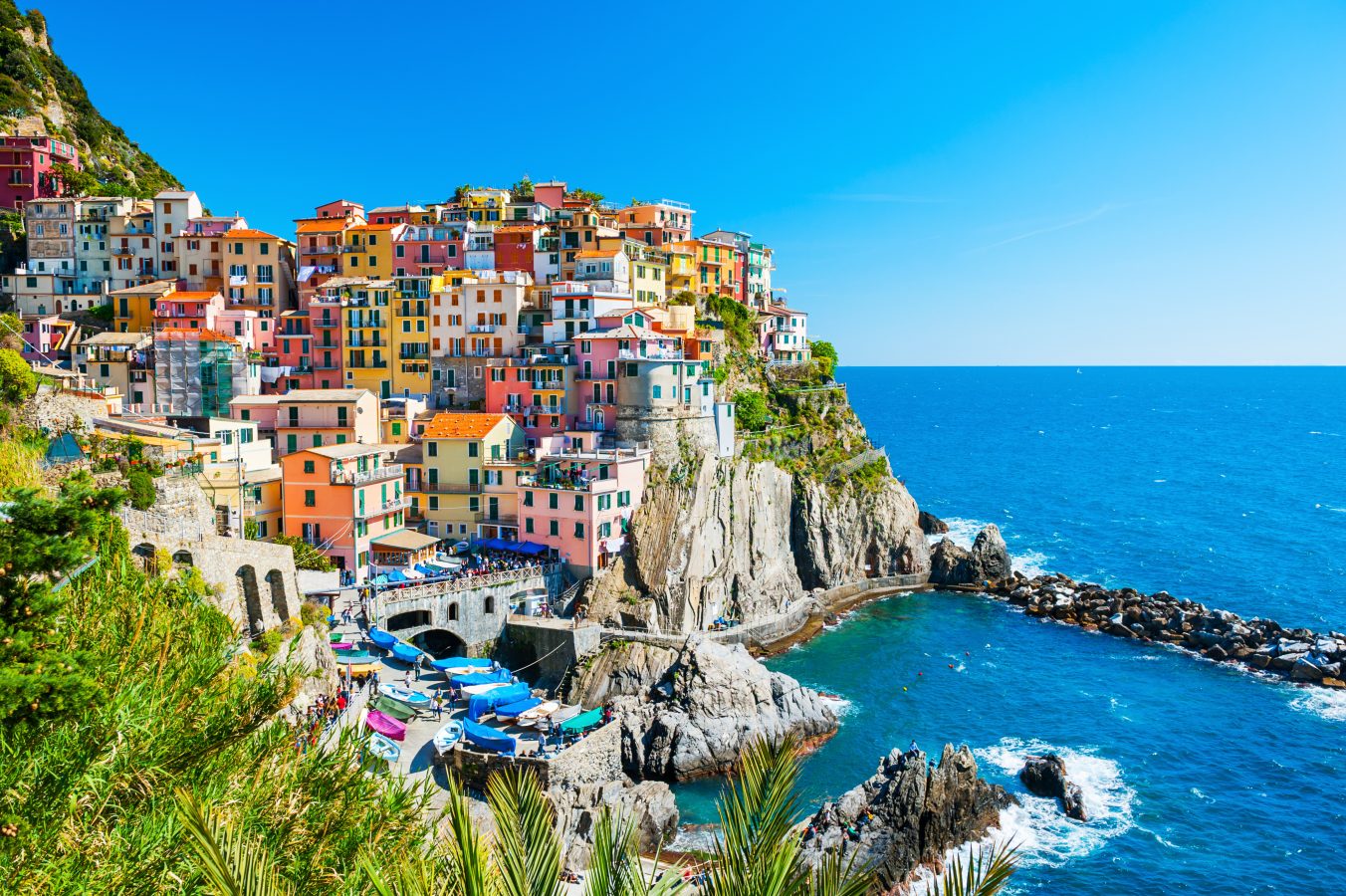 Beautiful view of Manarola town in Cinque Terre national park. The towns in Cinque Terre are amazing destinations to visit in Italy.