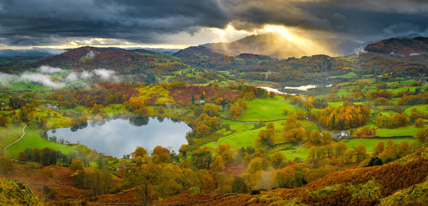 The view from Loughrigg Fell near Ambleside in the Lakes District of the UK in autumn.