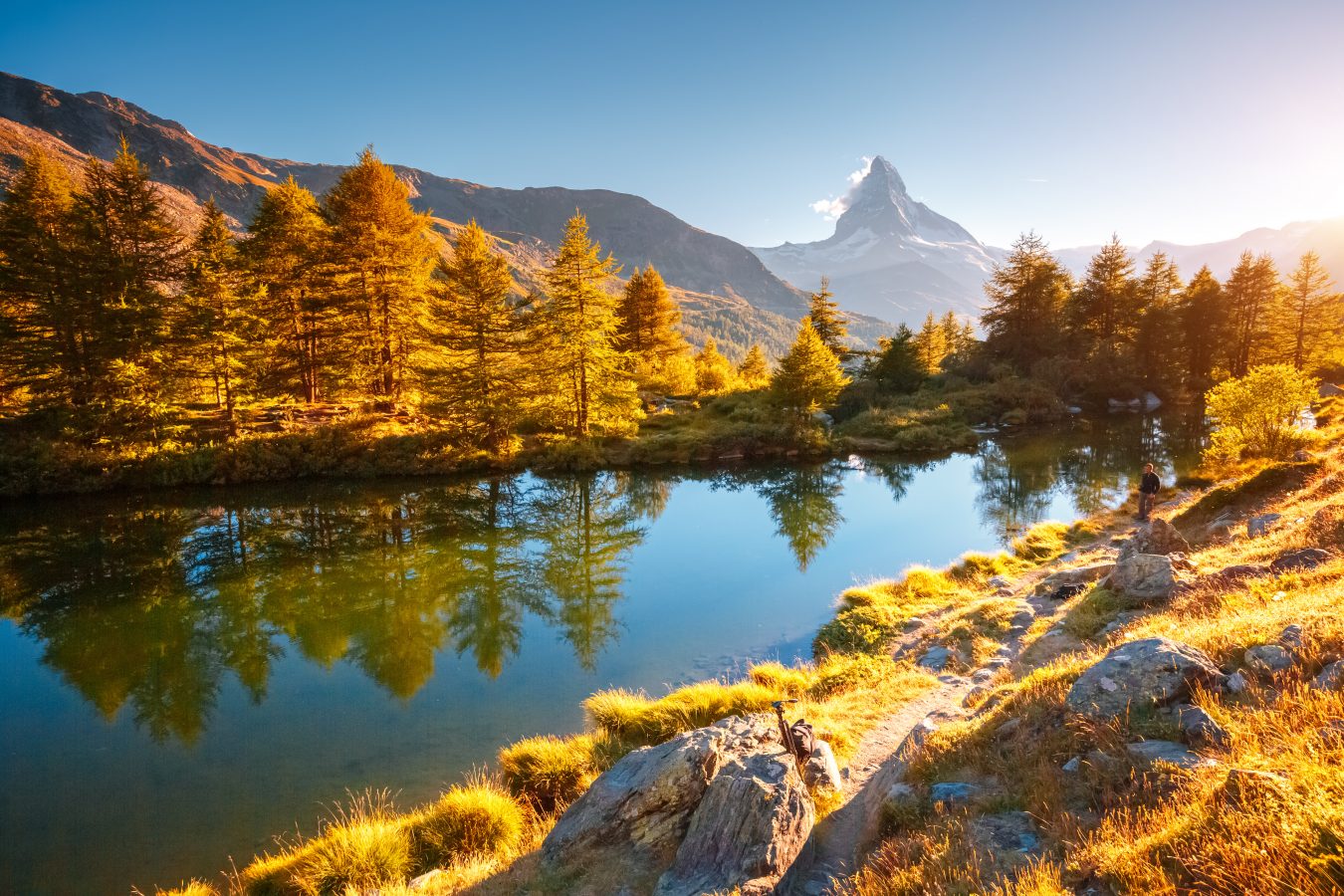 View of Matterhorn spire in the distance from Grindjisee lake, Cervino peak, Swiss Alps, Switzerland, Europe.