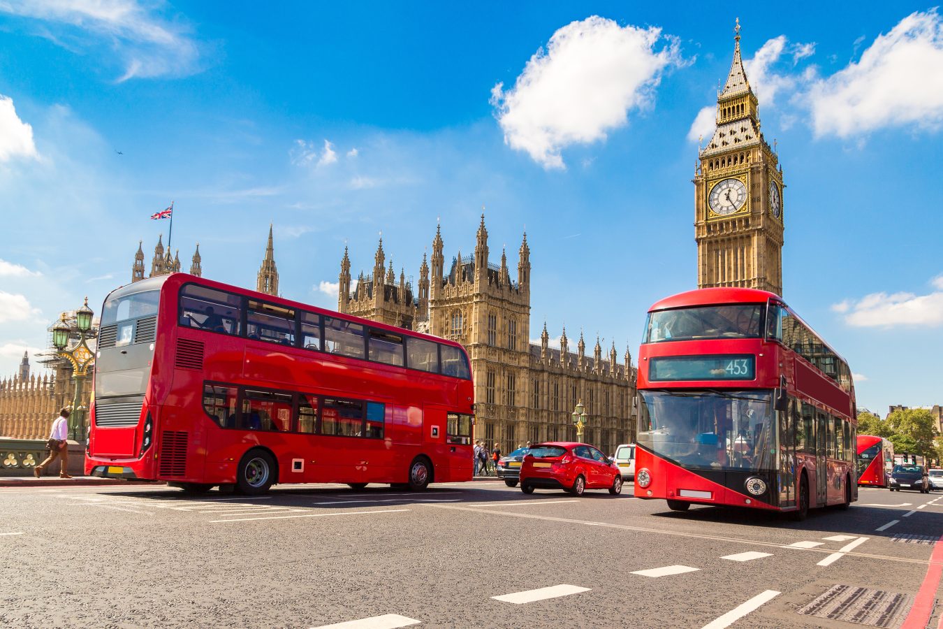 Big Ben, Westminster Bridge and red double decker bus in London, England, United Kingdom